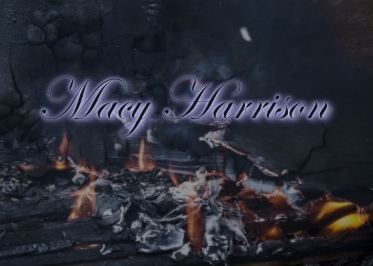 Text 'Macy Harrison' over a background of ashes and flames.